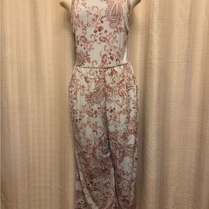 Elegant Paisley Jumpsuit in light blue/burgundy.
